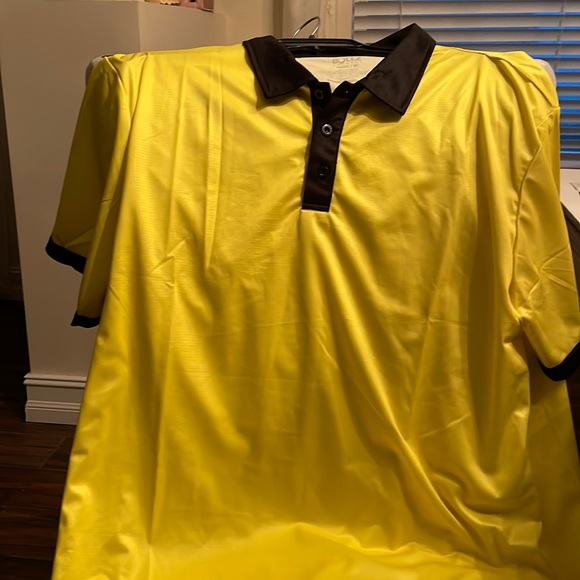 Mens short sleeve polo shirt sizeXL.Shirt yellow with black collar and neckline.